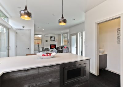 Kitchen looking out at living room